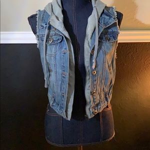 Denim vest with a gray hood